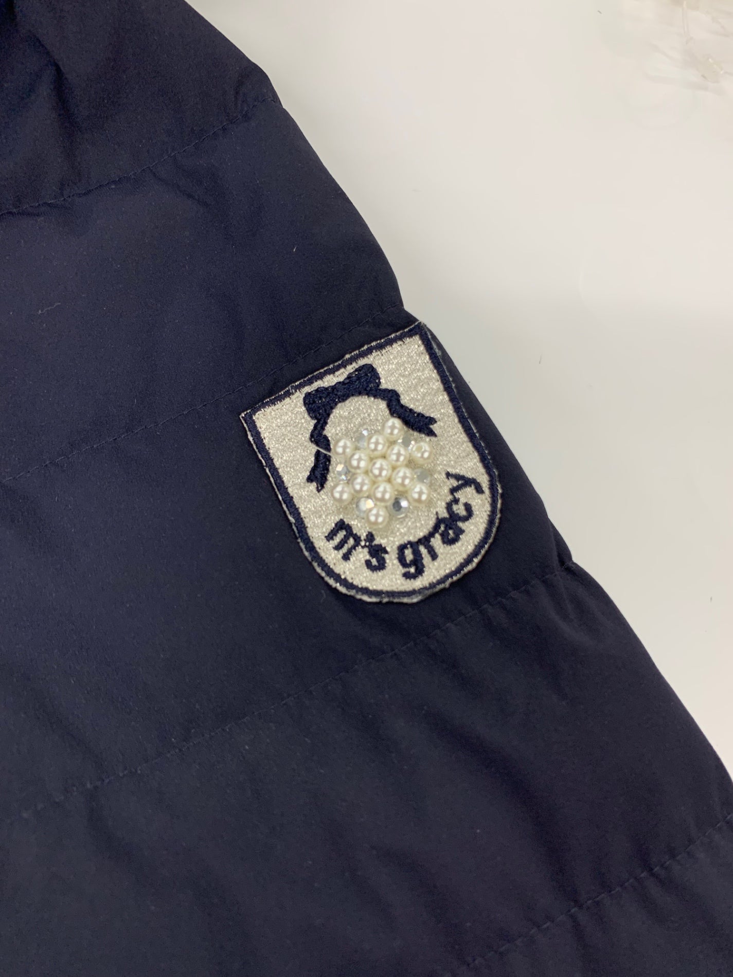 エムズグレイシー フェイクファー付きロングダウンコート 319605 38 ネイビー カメリアジップ IT97AZHWLHTE