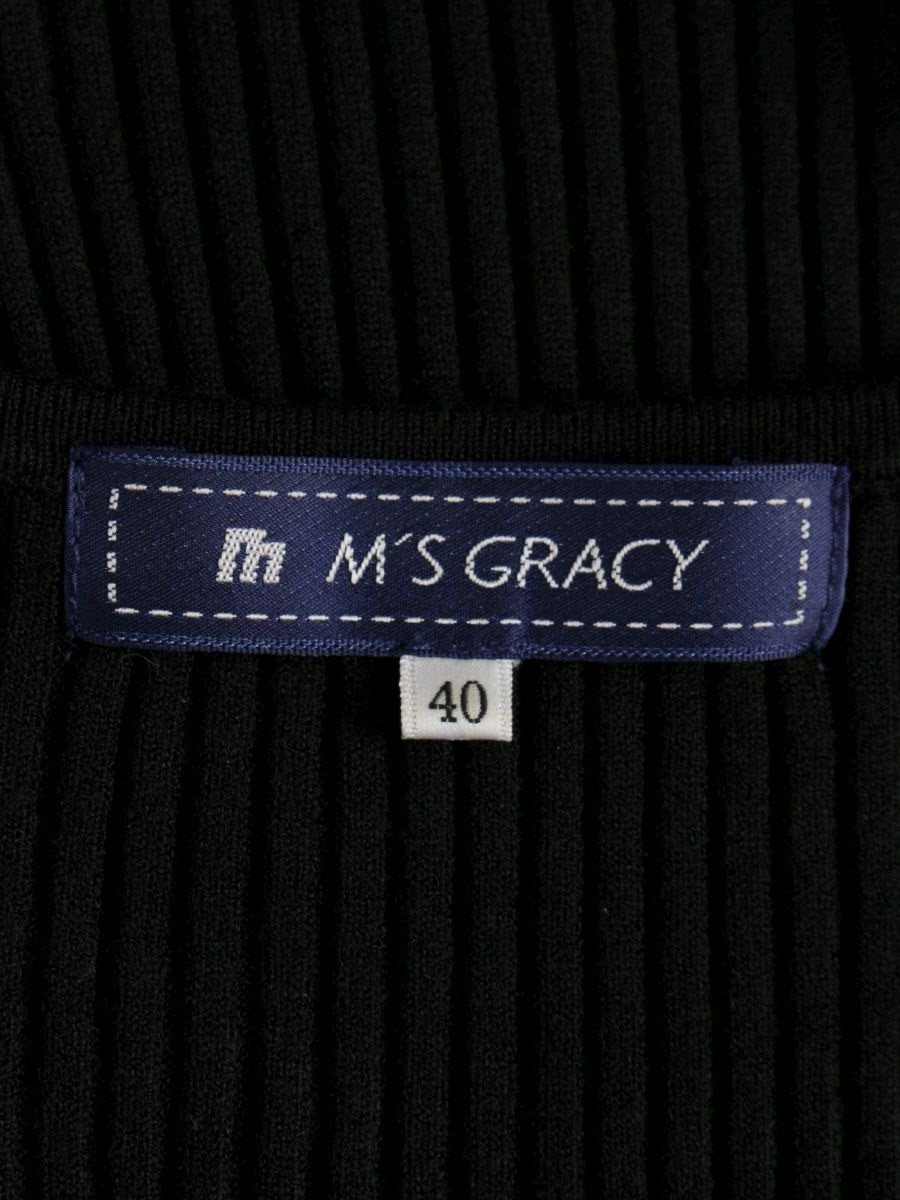 さち。 エムズグレイシー　ペプラムニット　パール付きリボン　ネイビー さち様専用。 エムズグレイシー ペプラムニット パール付き