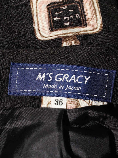 エムズグレイシー 317535 スカート 36 ブラック 香水瓶 花 ITN0AB3WZCKG