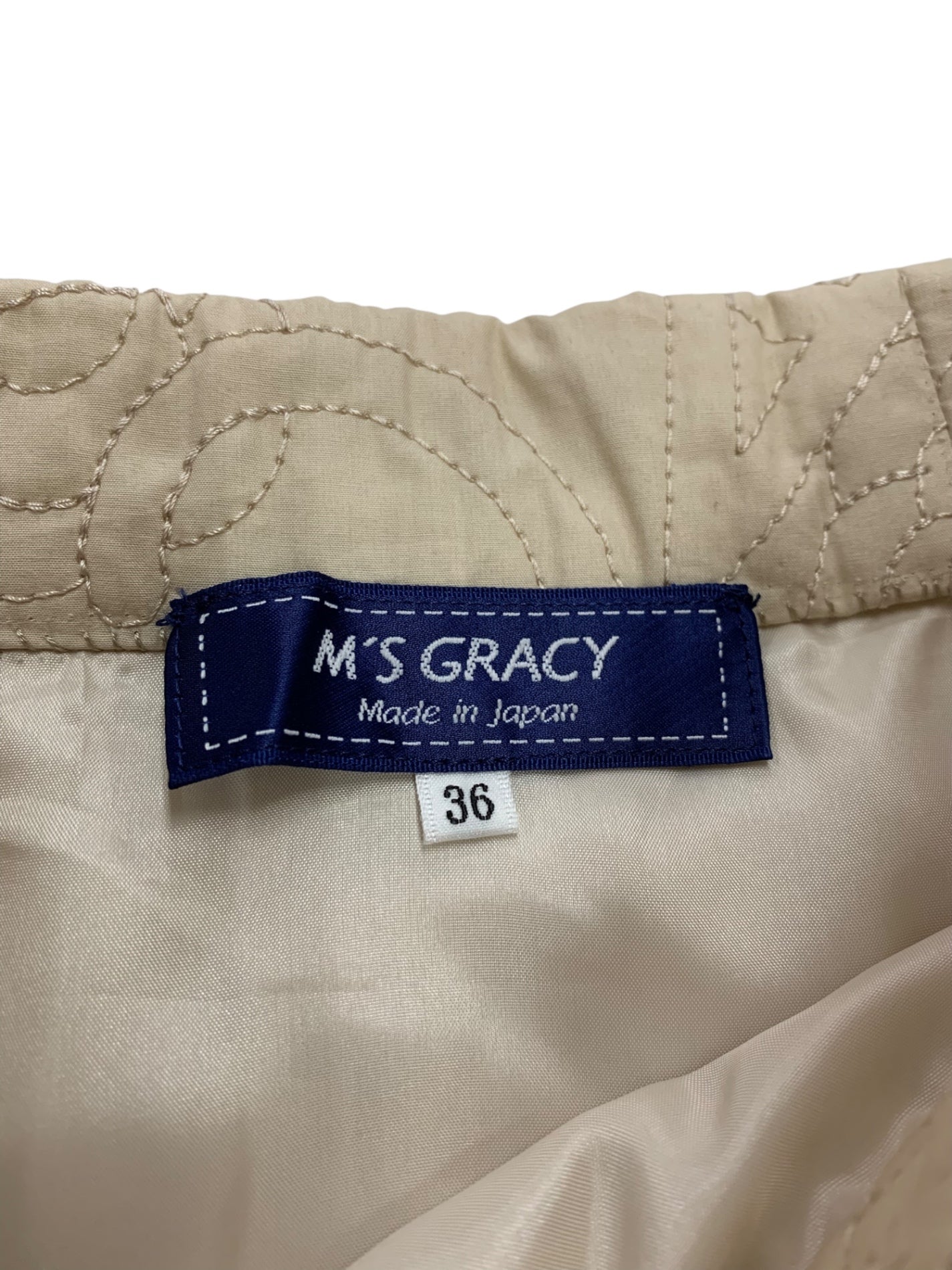 エムズグレイシー 517119 スカート 36 ベージュ カメリア ロゴ 刺繍 フレア IT43GXTK44RK