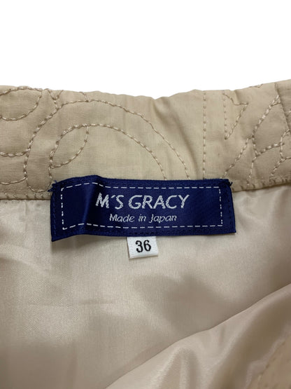 エムズグレイシー 517119 スカート 36 ベージュ カメリア ロゴ 刺繍 フレア IT43GXTK44RK