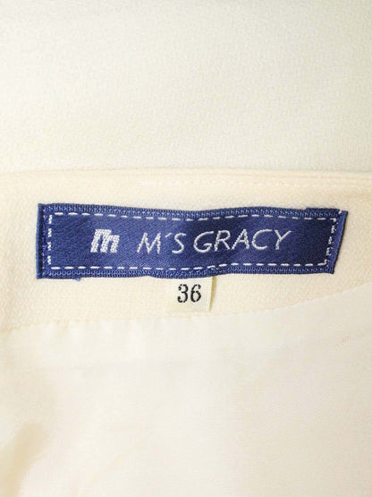 エムズグレイシー 121598 ワンピース 36 アイボリー/ブラック フラワーモチーフ スパンコール 切替 ITC1N9CVC9MU