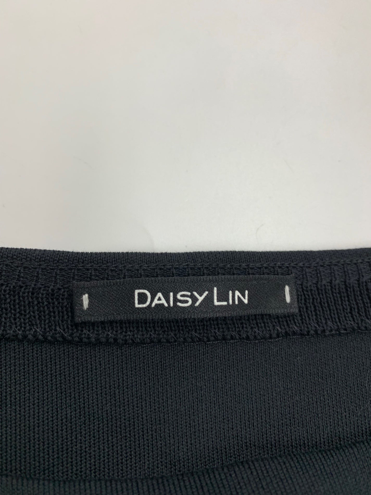 デイジーリン 06596 ニット 42 ブラック フリル ITKQ1WFWM12E