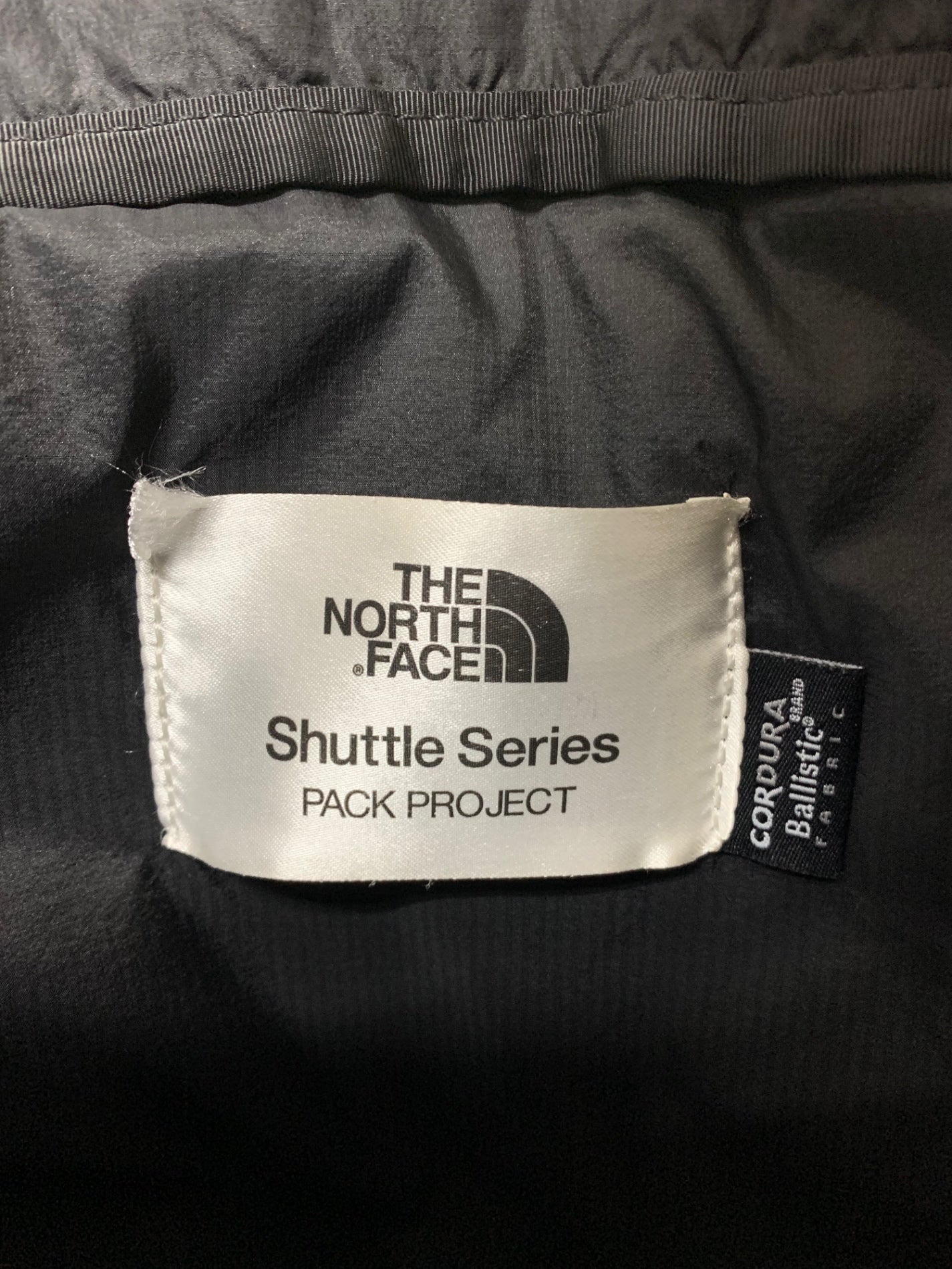ノースフェイス SHUTTLE DAY PACK SLIM 18L シャトル デイパック スリム  NM82055 バックパック ブラック リュック ナイロン IT30XICV4AQO