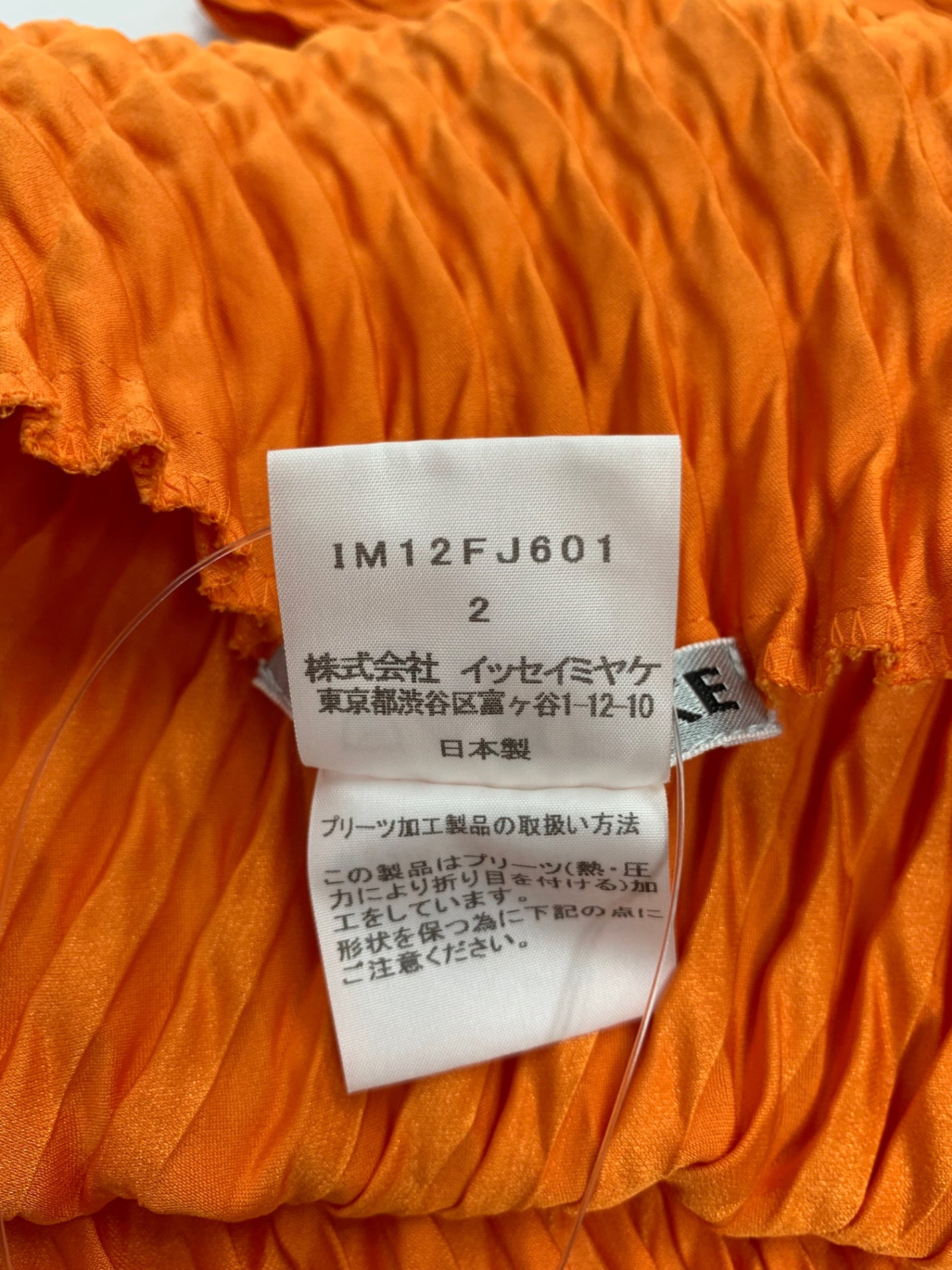 イッセイミヤケ IM12FJ601 トップス 2 オレンジ サークルカットノースリーブ IT7NPZ6VFO1C