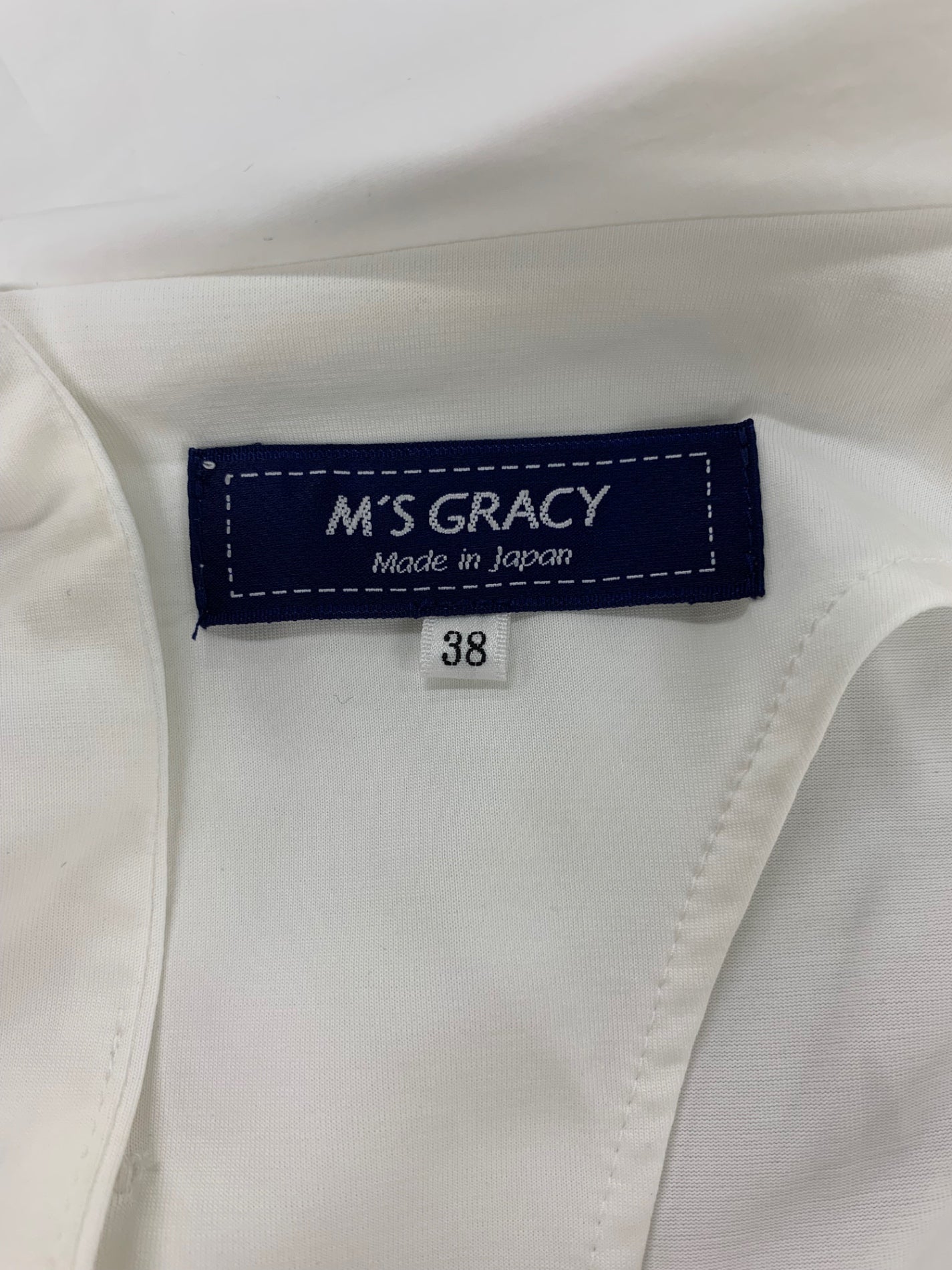 エムズグレイシー 015331 カットソー 38 ホワイト ロールカラー バックボタン ITW0SLD35DDV
