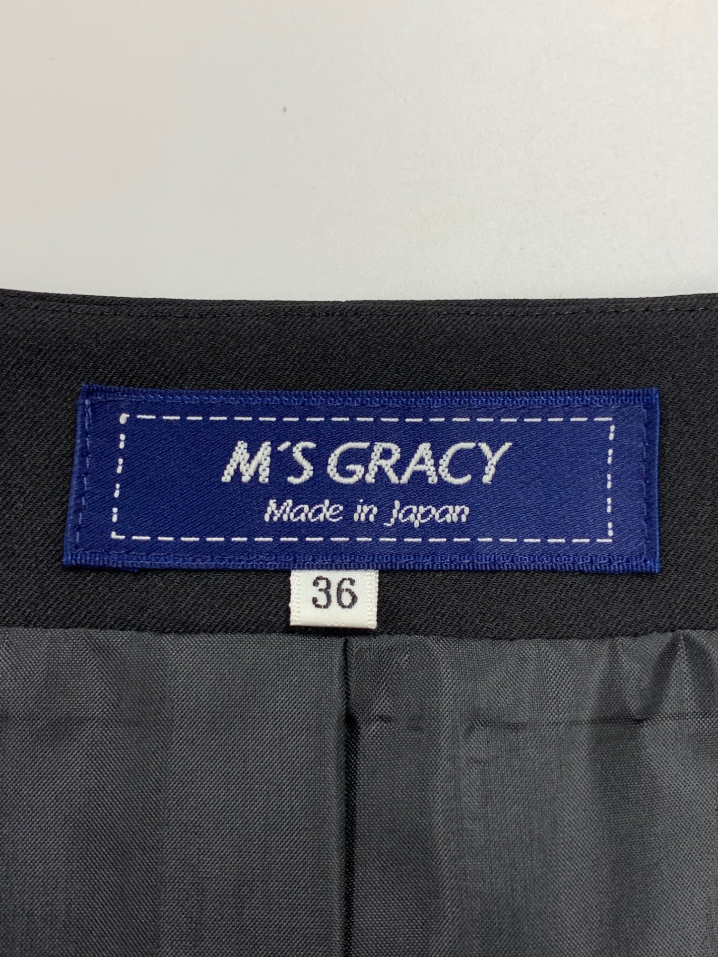 エムズグレイシー 511516 ワンピース 36 ブラック フロントジップ リボン ITPXAGL7S552 【SALE】