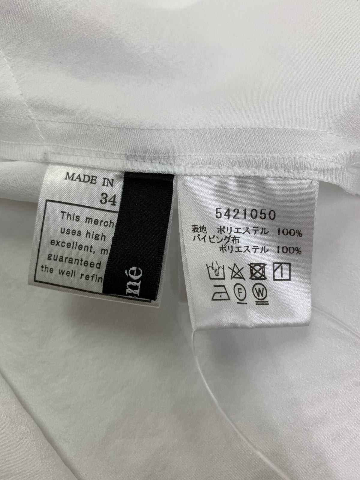 ルネ 5421050 トップス 34 ホワイト サイドスリット シルバーボタン ITEB0QK036O0