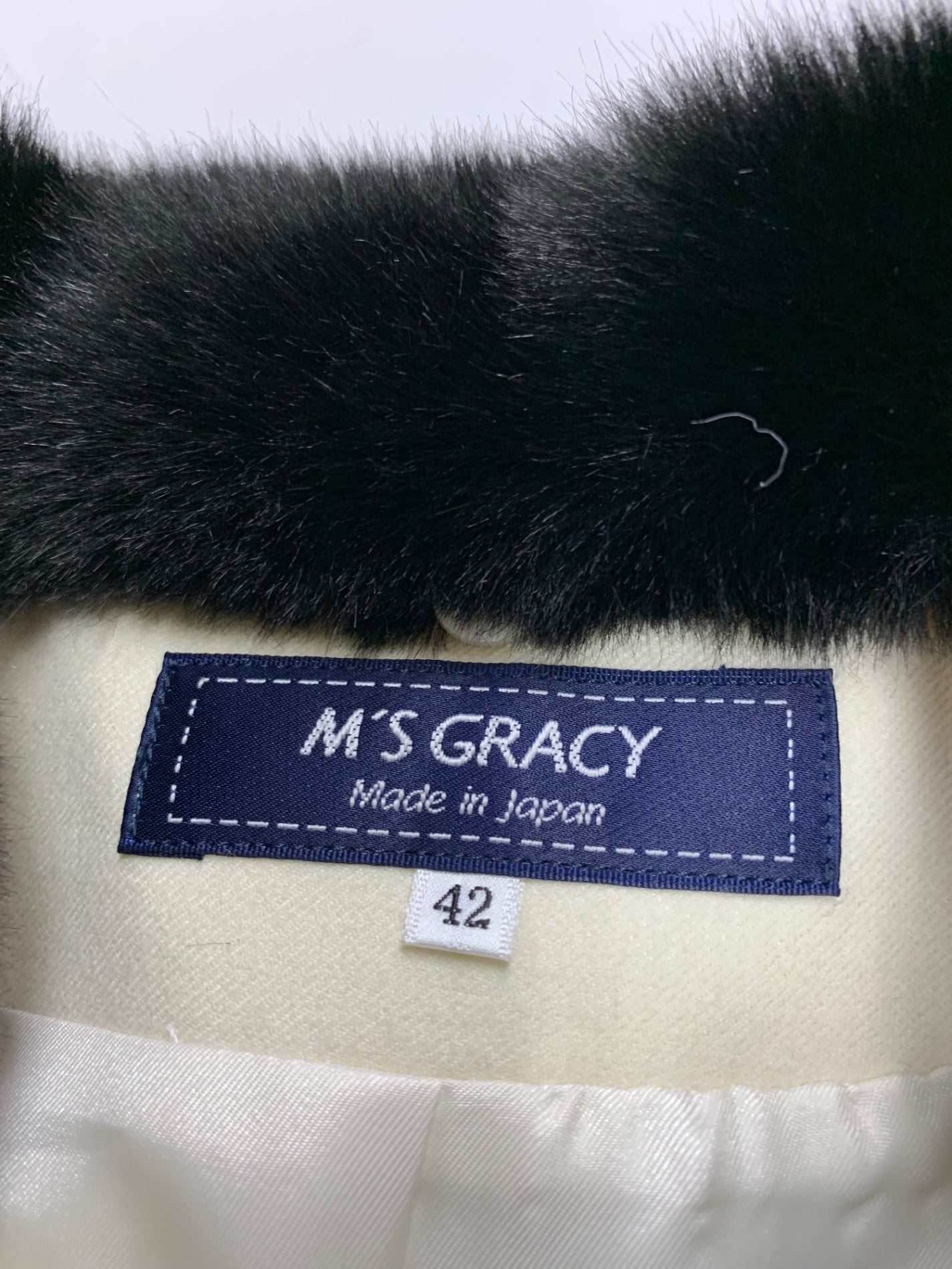 エムズグレイシー ドット風ペプラム 419610 ショートコート 42 ホワイト リボン フェイクファー衿 ITXRJYOTLGLC