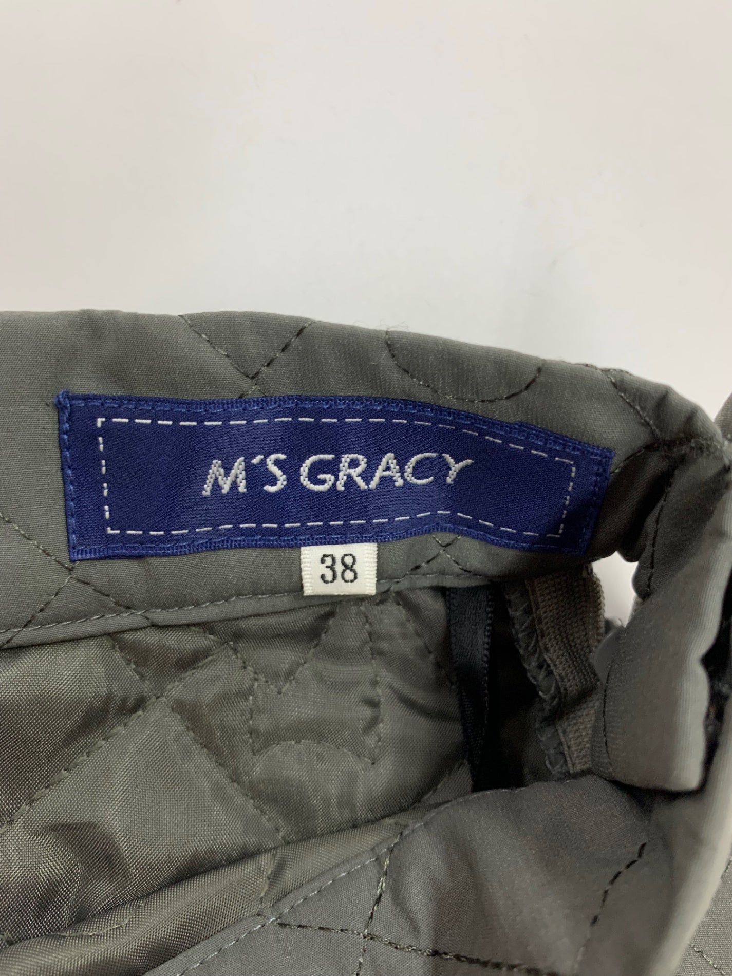 エムズグレイシー カメリアｘリボン柄キルティングフレア 417613 スカート 38 グレー ITW9BUKDG8V4