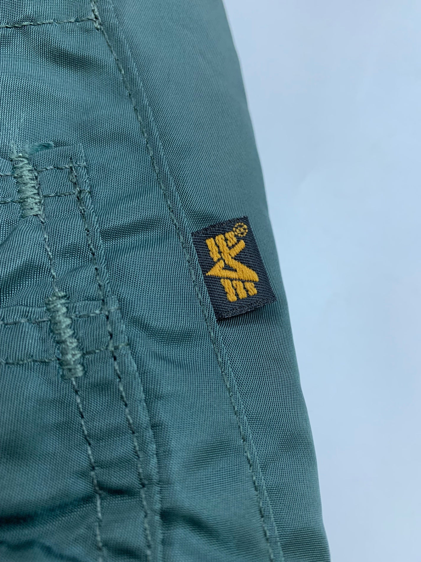 アルファインダストリーズ ブルゾン M カーキグリーン リバーシブル ロゴ刺繡(オレンジ) ITHP8WJ5TS2I