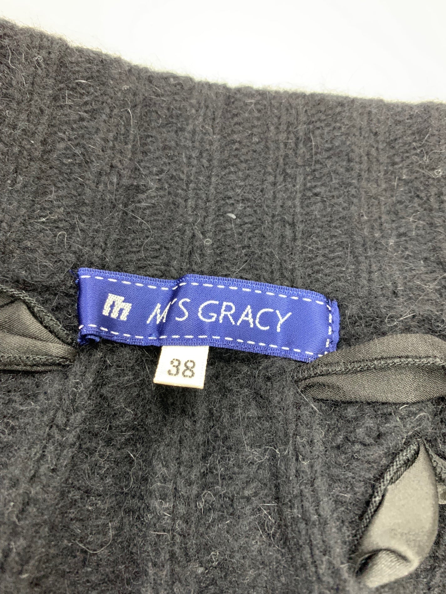 エムズグレイシー 028555 ポンチョ ブラック リボン ニット ファー ITW4G3E741RW