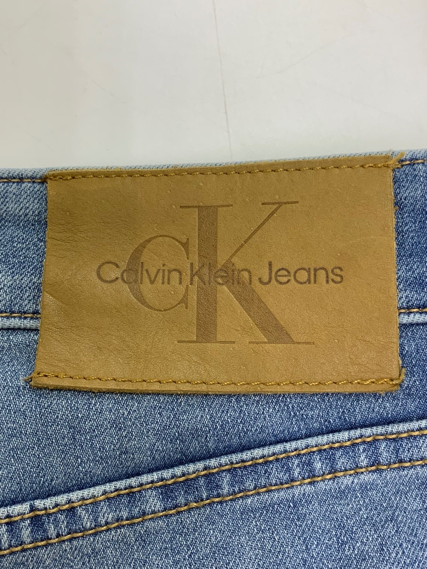 カルバンクラインジーンズ スリム J326407 デニムパンツ ブルー ダメージ加工 IT1PI7MNZWQG