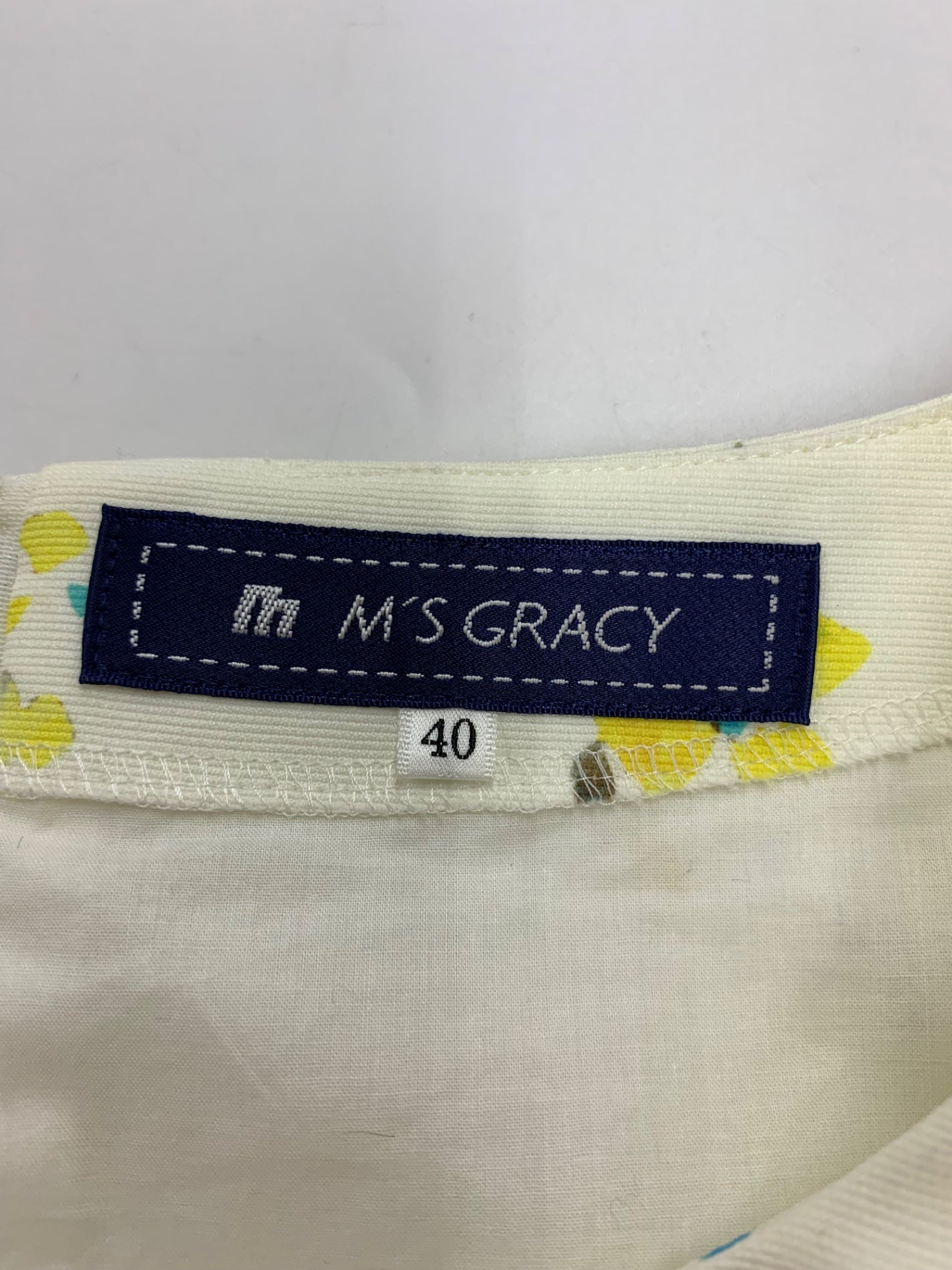 エムズグレイシー 621137 ワンピース 40 ホワイト フラワーモチーフ グログランリボン IT64GRHW1LDC