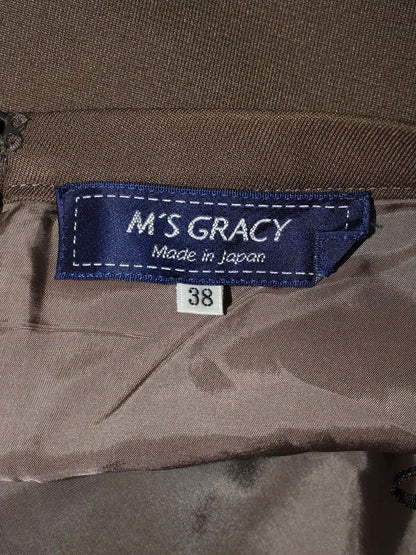 エムズグレイシー Purple Skirt 817514 スカート 38 カーキ ITLI6LPQ4LAO 【SALE】