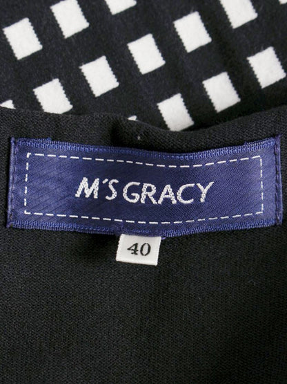 エムズグレイシー フィット＆フレアニット 018338 ワンピース 40 ブラック リボン ITXI3ABWB68S