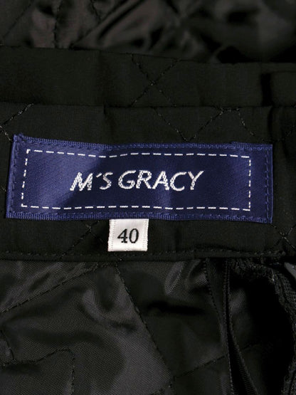 エムズグレイシー カメリアｘリボン柄キルティングフレア 417613 スカート 40 ブラック ITBCMPIOEDDC