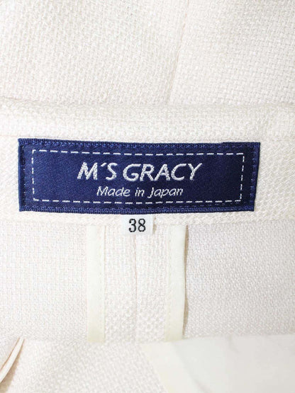 エムズグレイシー 914110 ジャケット 38 アイボリー カメリアボタン ラインストーン ITZACHJYH3IO