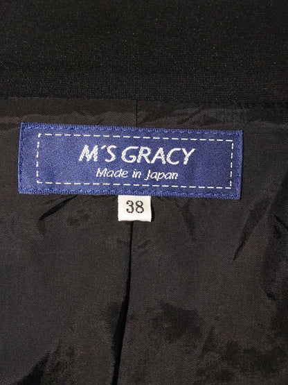 エムズグレイシー 014103 ジャケット 38 ブラック 裾フリル テーラード ITGSHIV2WFRU