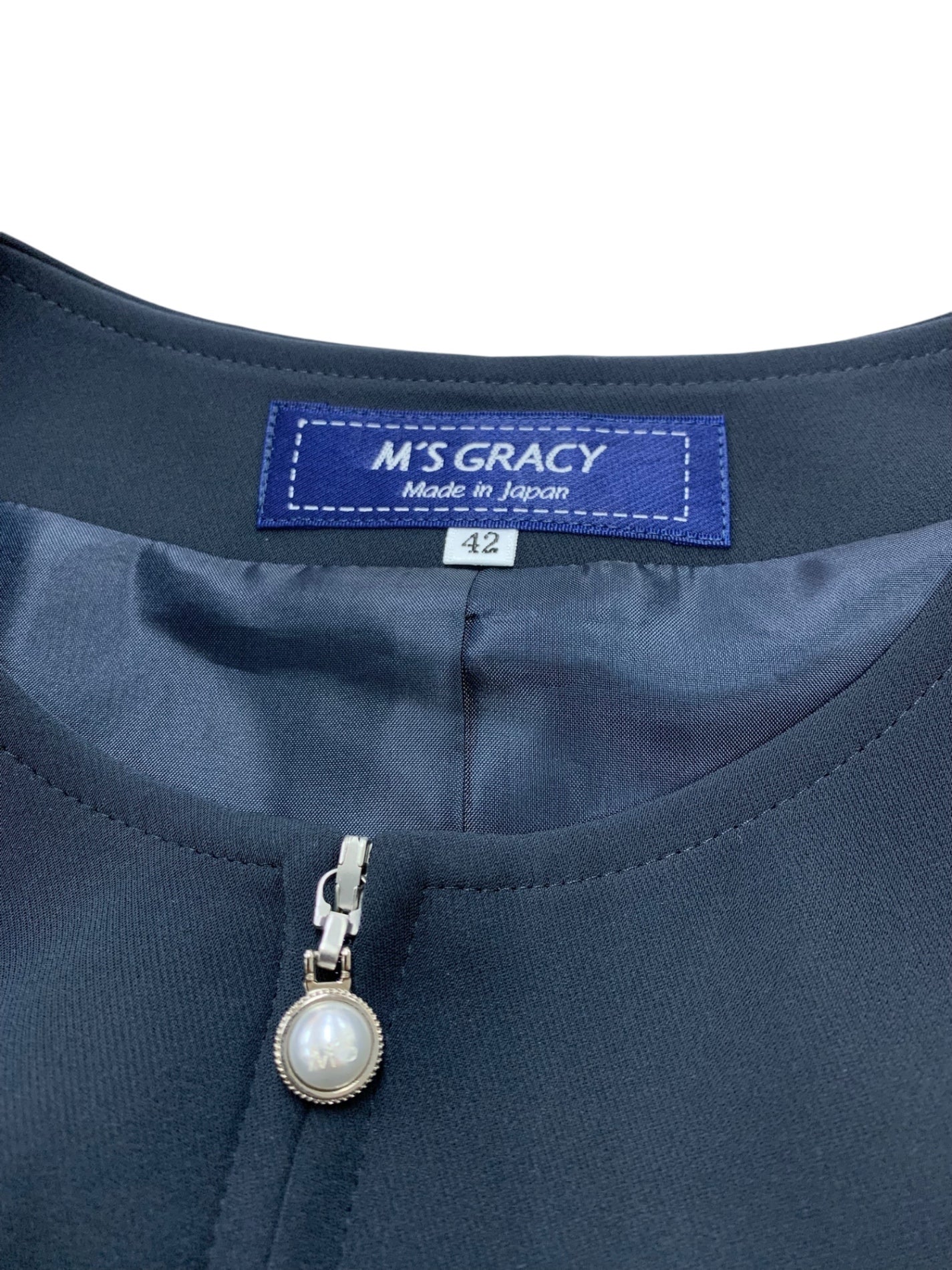 エムズグレイシー 514122 ジャケット 42 ネイビー ノーカラー リボン ジップアップ IT2UCRS0WJ6G