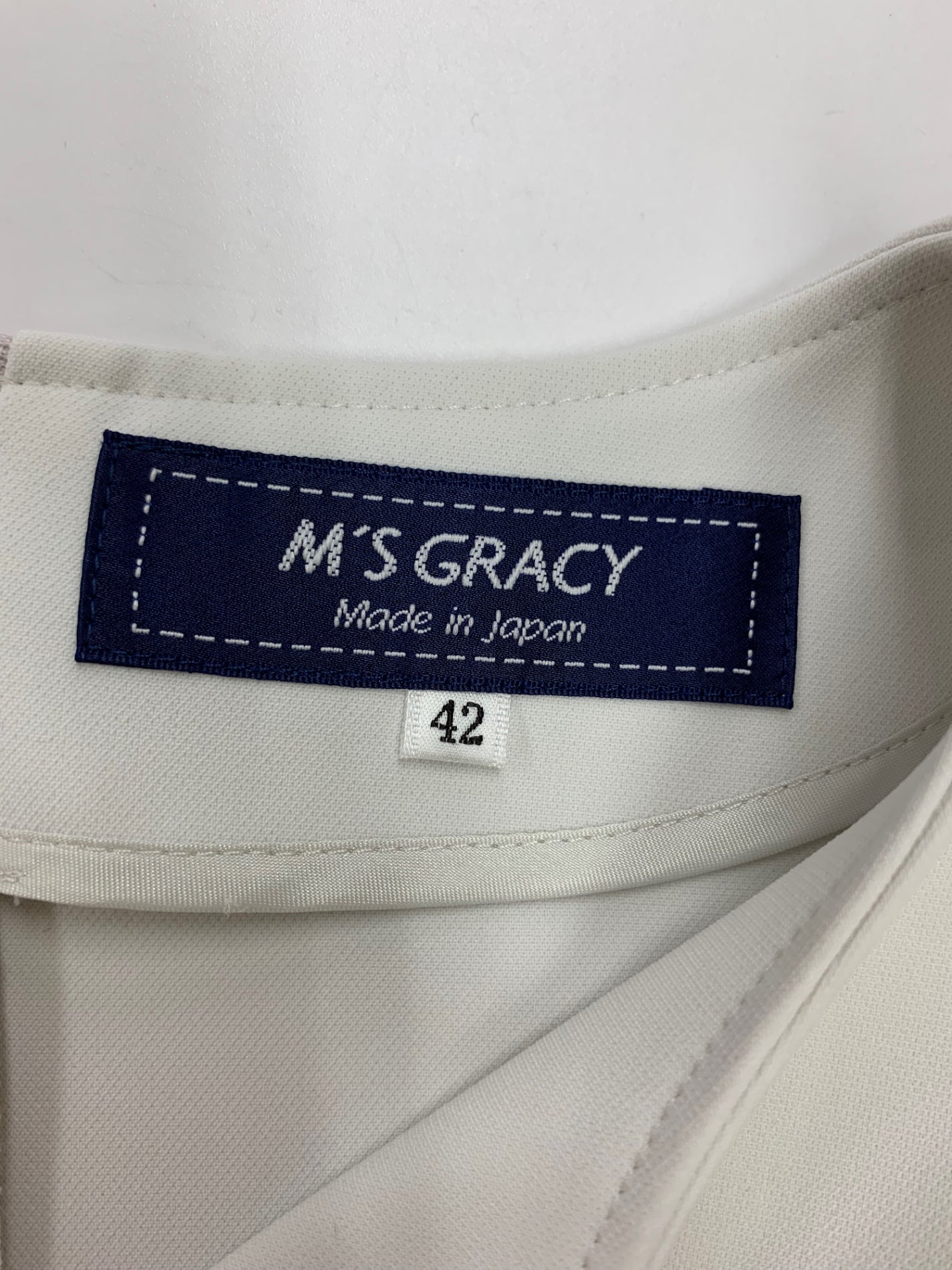 エムズグレイシー フェイクファーポンポンつきジャケット 414509 ブラウス 42 グレー IT77PGCQPCRG