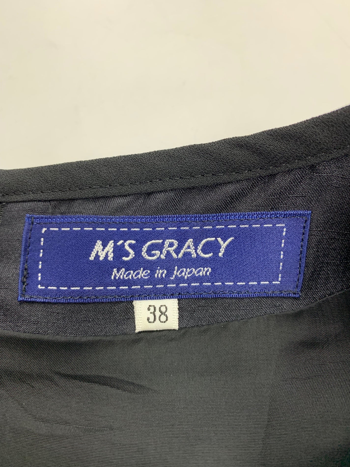 エムズグレイシー 111704 ワンピース 38 ブラック リボン アイコンモチーフ IT6I5H4SP72G