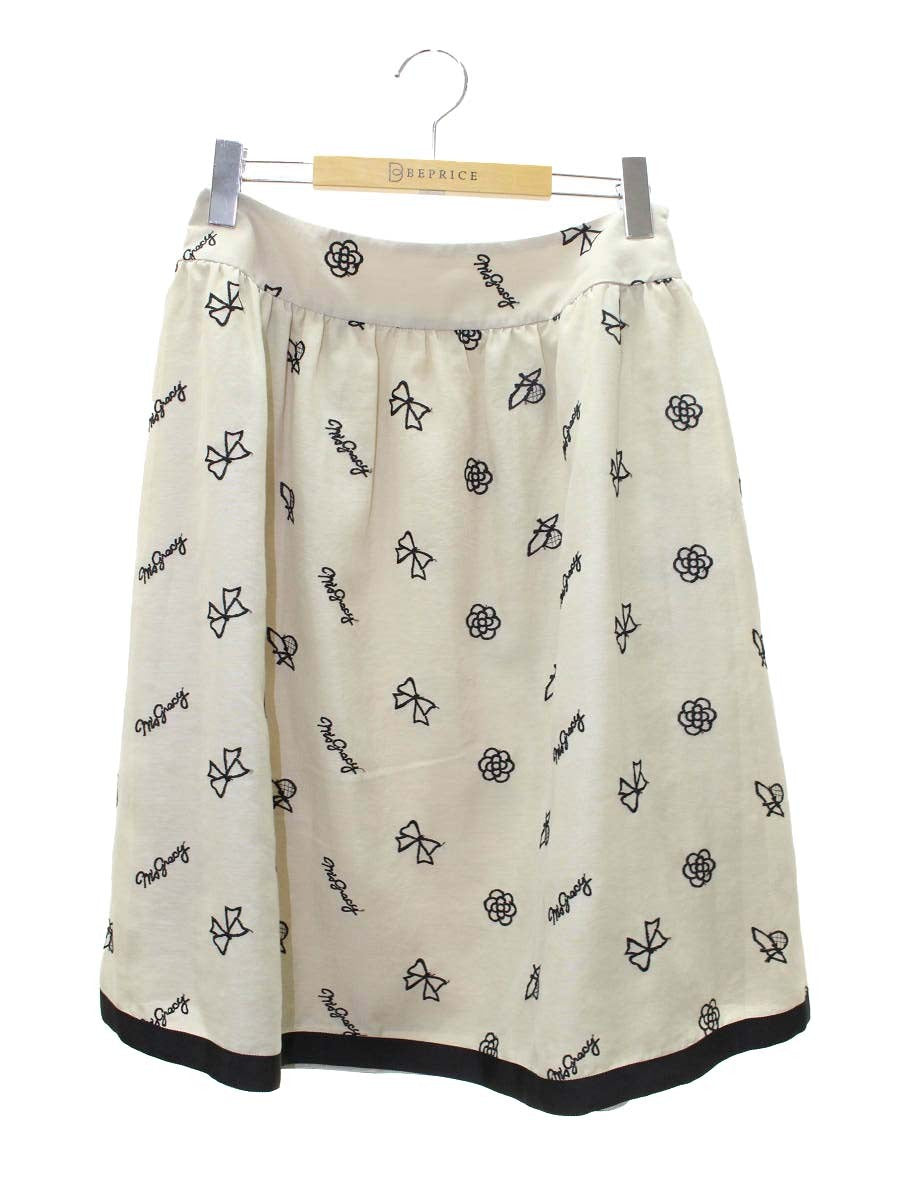 エムズグレイシー 117303 スカート 40 ベージュ アイコンモチーフ 刺繍 カメリア IT7W36P9GEZM