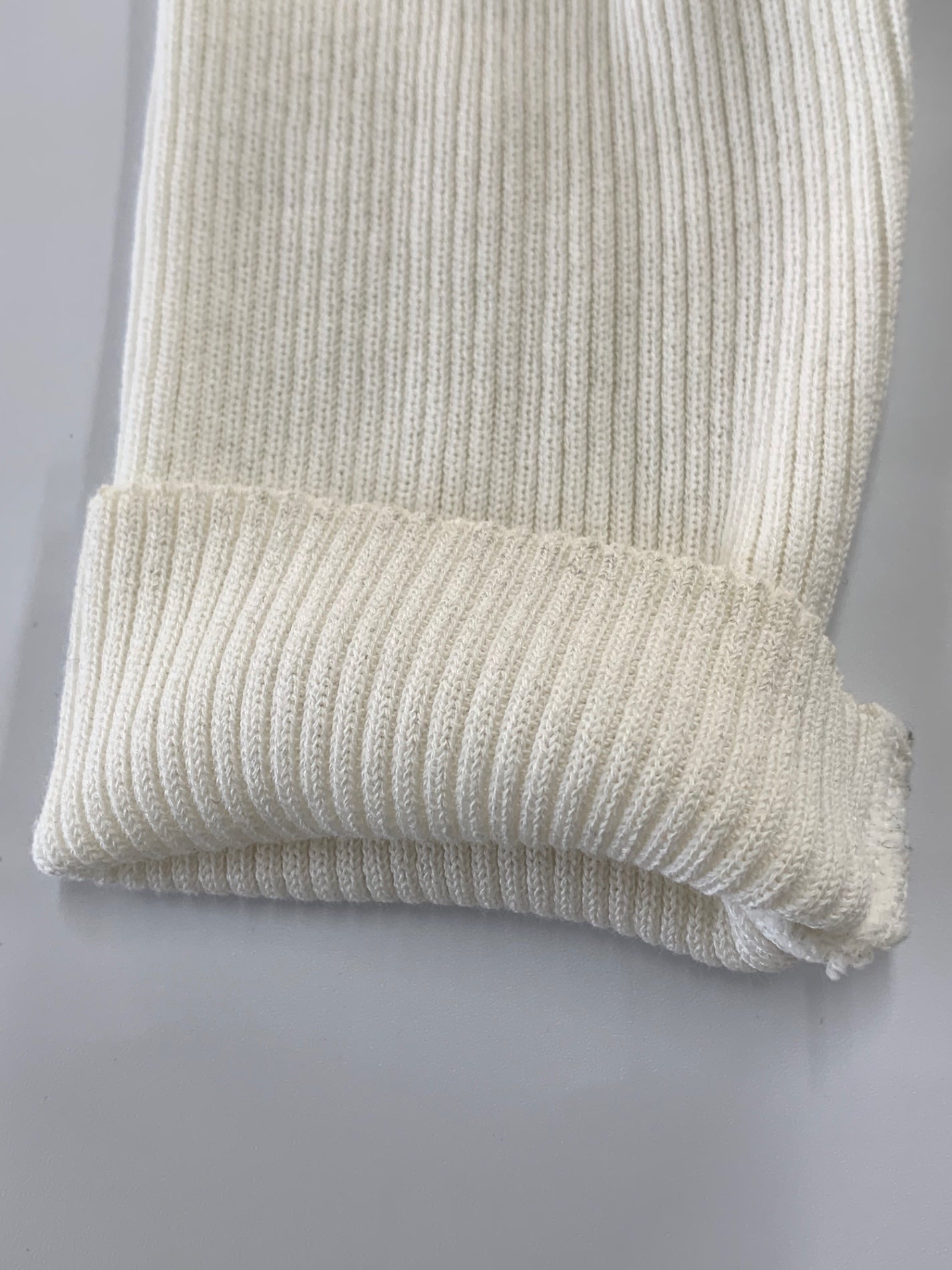 エムズグレイシー 018106 ニット 38 ホワイト リブ袖 ハイネック スパンコール リボンモチーフ ITGUFF2J3E4C