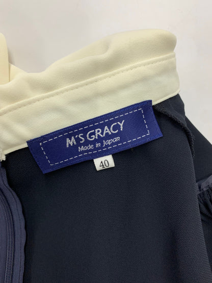 エムズグレイシー 410109 トップス 40 ネイビー 花ブローチ付き 白襟 IT42BD72RZE0