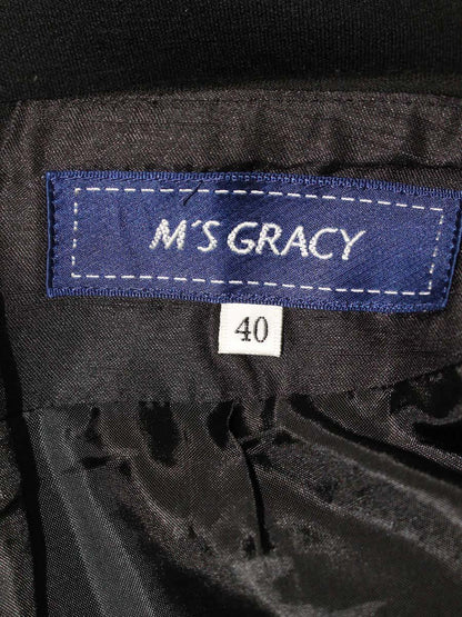 エムズグレイシー 917508 スカート 40 ブラック フラワーモチーフ タックフレア IT7YKMUOWSZO