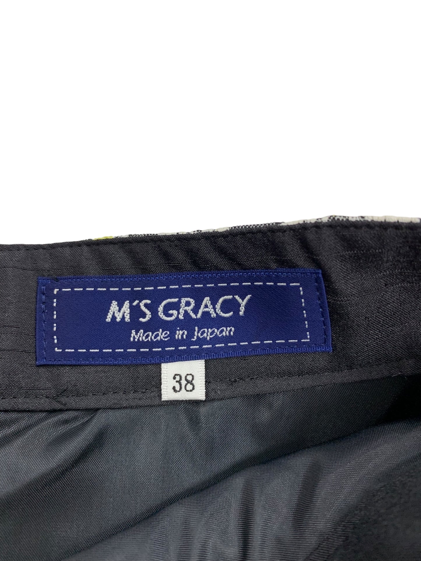 エムズグレイシー 517111 スカート 38 ブラック デイジー柄ジャガード ITPAU4I1ZO25