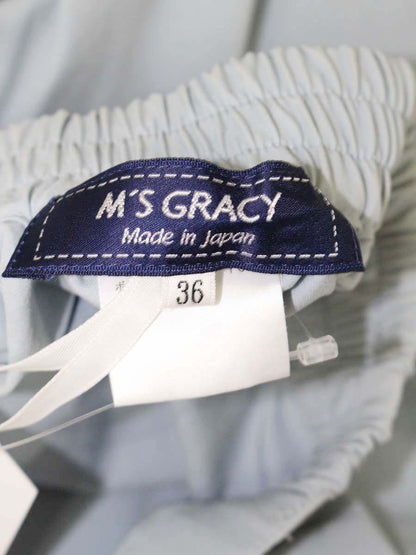 エムズグレイシー 116110 パンツ 36 ブルー リボン付きクロップドパンツ ITBHOXDW531C