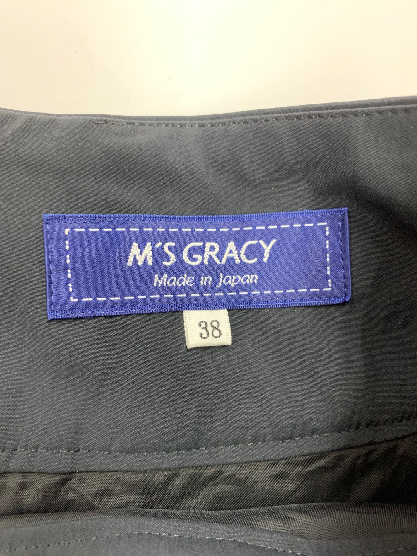 エムズグレイシー 727323 スカート 38 ブラック フレア カメリアボタン IT1A76RC4QW4