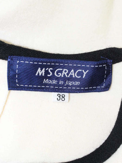 エムズグレイシー 115603 トップス 38 アイボリー アニマルロゴ ITZP6B3ON2WU